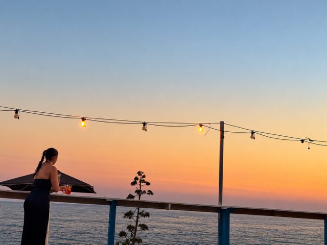 Lior at a seaside terrace at sunset in Marina di Modica
